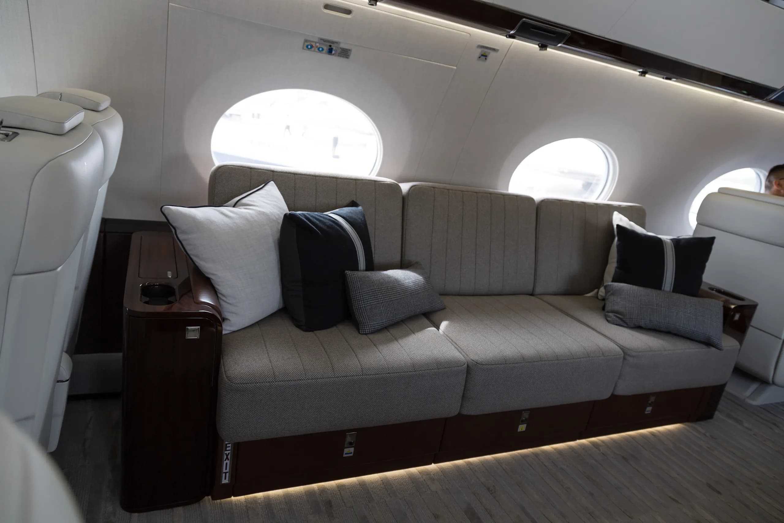 The lounge of a Gulfstream G650ER, with a three-seat sofa